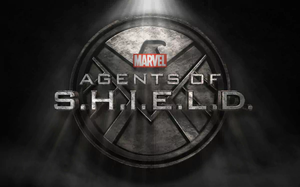 HD PC desktop wallpaper featuring the Marvel TV show Agents of S.H.I.E.L.D. logo with a dark, metallic shield background and dramatic lighting.