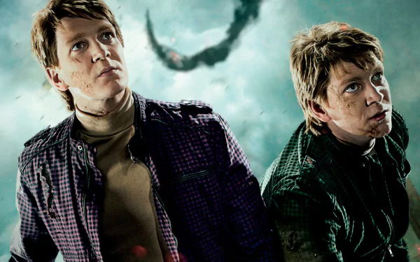 High-definition wallpaper from Harry Potter and the Deathly Hallows: Part 2, featuring characters looking upward with a dramatic background.