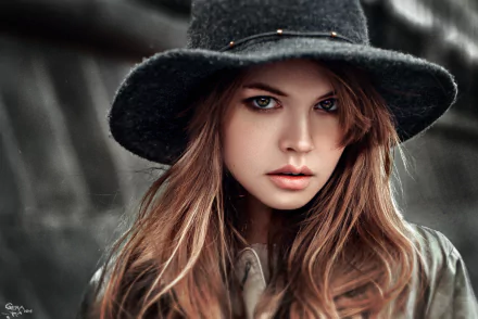 HD desktop wallpaper featuring a brunette woman with green eyes wearing a hat, tagged as a model, with the name Anastasiya Scheglova.