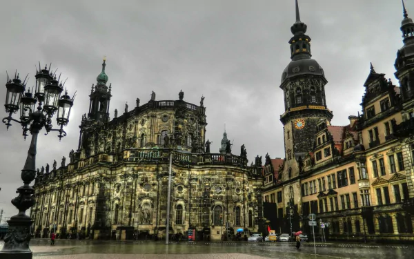 Gothic architecture of a historic building in Dresden, Germany, captured in an atmospheric HD image, showcasing intricate details against a moody sky.