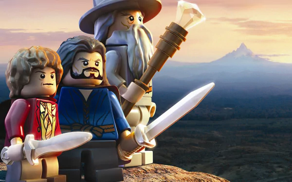 Lego figures of Gandalf, Bilbo Baggins, and another character stand together, wielding swords against a scenic background from The Lord of the Rings. HD desktop wallpaper.