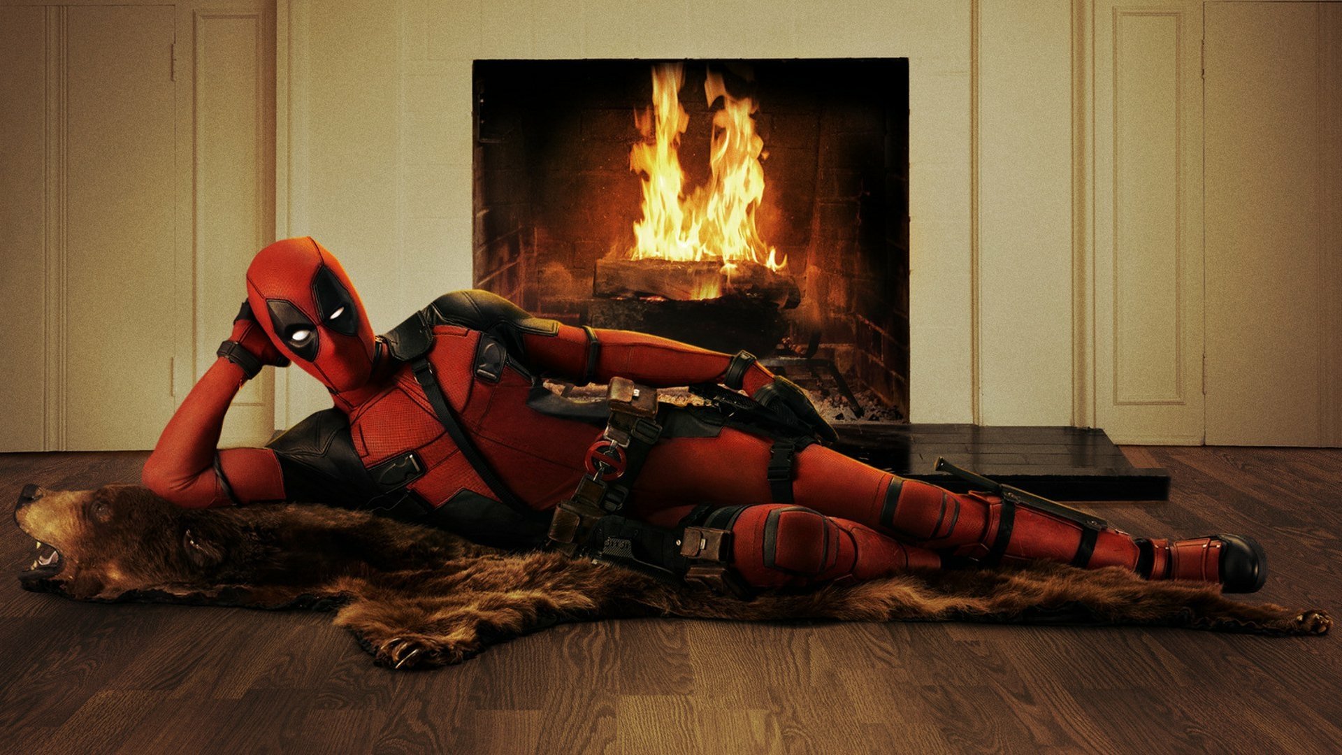 A high-definition wallpaper featuring Deadpool lounging leisurely in front of a cozy fireplace, embodying his playful and irreverent character.