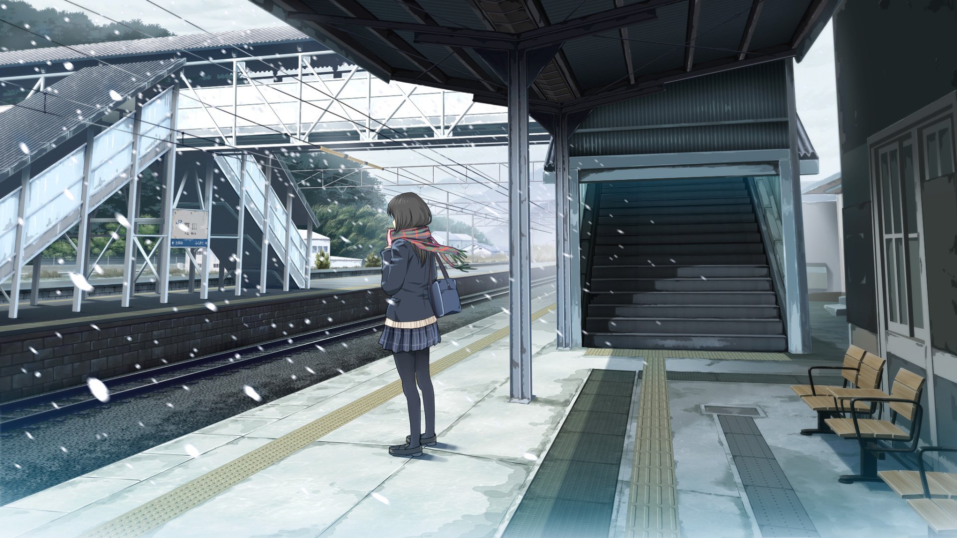 A serene anime scene at a train station, featuring a girl in a school uniform waiting as snow gently falls, creating a peaceful atmosphere for an HD desktop wallpaper.