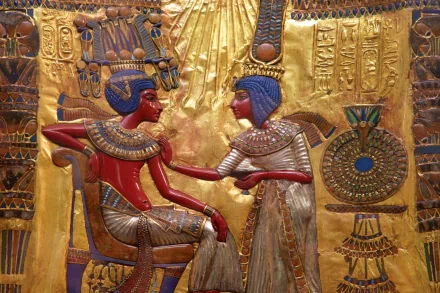 A vibrant HD wallpaper featuring an Egyptian scene, showcasing intricately detailed figures adorned in colorful attire against a golden background.