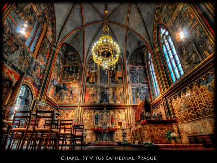 HDR image of the ornate interior of St. Vitus Cathedral in Prague, featuring detailed arches, religious artwork, and a grand chandelier.