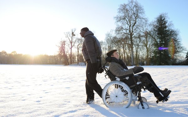 Movie The Intouchables Omar Sy Driss François Cluzet Philippe Wheelchair Smile Snow Sunrise HD Wallpaper | Background Image