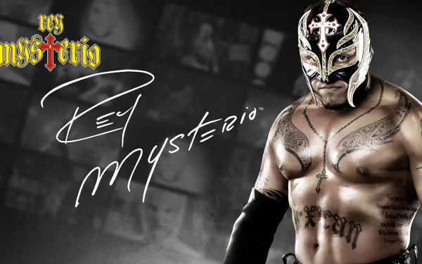 HD WWE desktop wallpaper featuring a masked wrestler with Rey Mysterio text overlay.
