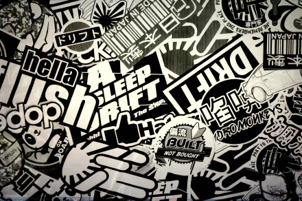 HD desktop wallpaper featuring an eclectic sticker bomb design with a variety of monochromatic stickers overlapping each other.