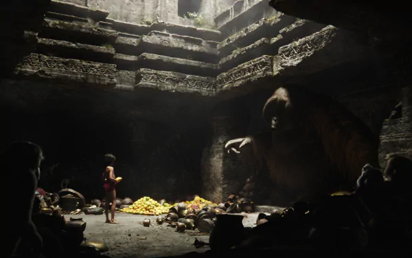 HD PC desktop wallpaper from the movie The Jungle Book (2016) depicting Mowgli standing inside an ancient, dimly lit stone temple with a large ape-like creature.