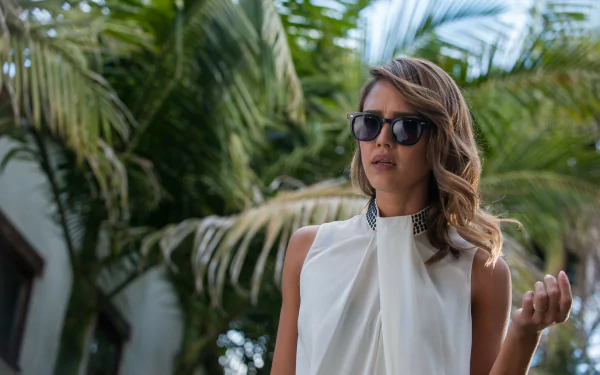 Jessica Alba in a scene from the movie Some Kind of Beautiful, captured in a 4K Ultra HD desktop wallpaper with lush greenery in the background.