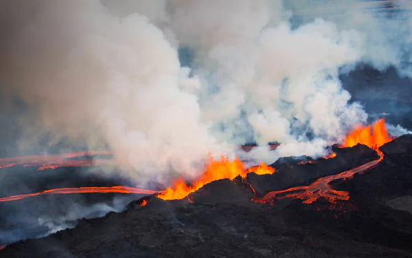 A 4K Ultra HD image capturing the intense eruption of Iceland’s Bárðarbunga volcano, with glowing lava flows and thick smoke rising into the sky.