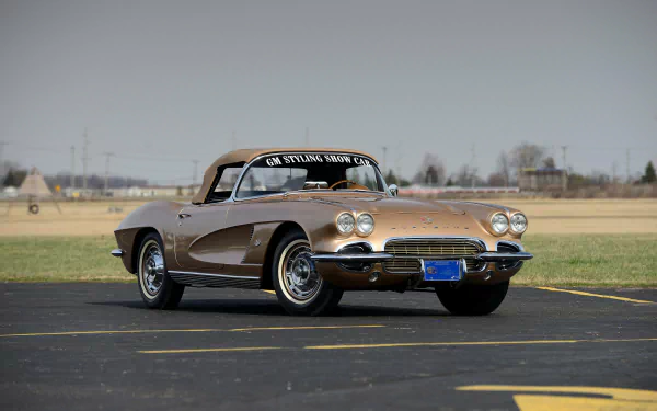 Classic Chevrolet Corvette (C1) parked on an airstrip, captured in stunning 4K Ultra HD, showcasing the iconic vintage vehicle in a clear and detailed desktop wallpaper.