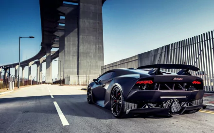 A sleek Lamborghini Sesto Elemento parked on an urban road, showcasing its stunning design against a backdrop of modern architecture and clear skies.