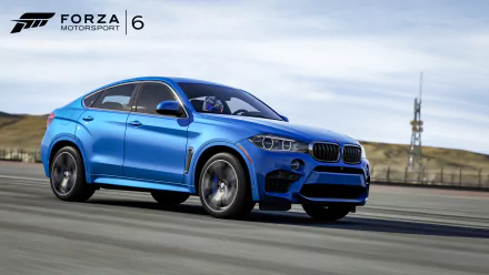 HD PC desktop wallpaper/background: blue BMW SUV racing on track from the video game Forza Motorsport 6, logo in top-left, blurred racetrack and sky background.