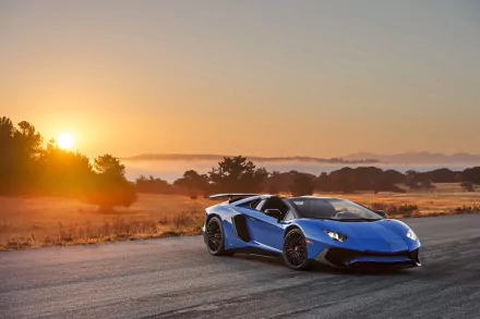 Blue Lamborghini Aventador SV supercar driving on a road at sunset, captured in a high-definition desktop wallpaper background.