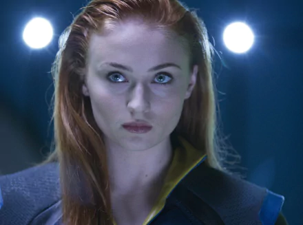 Sophie Turner as Jean Grey in a striking scene from Marvel's X-Men: Apocalypse, featuring her transformation into the powerful Phoenix. 4K Ultra HD desktop wallpaper.