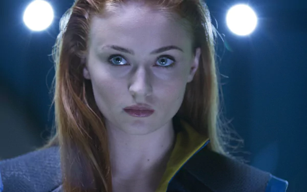 Sophie Turner as Jean Grey in a striking scene from Marvel's X-Men: Apocalypse, featuring her transformation into the powerful Phoenix. 4K Ultra HD desktop wallpaper.