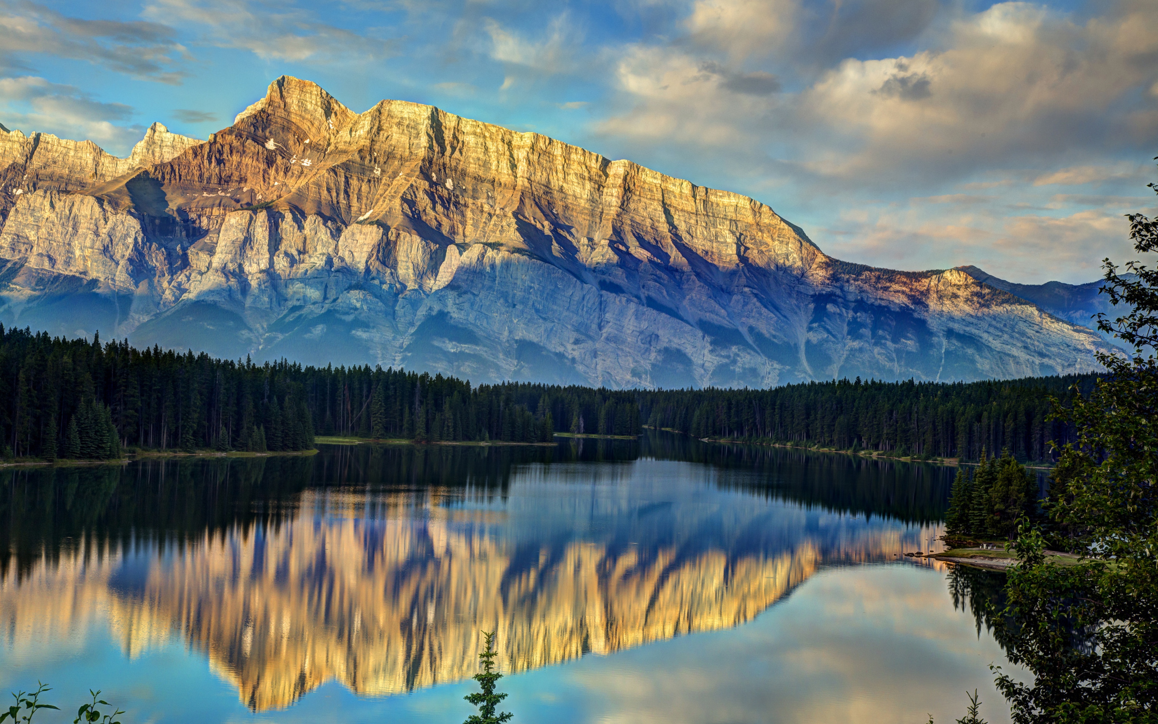 reflection of the mountains in a lake