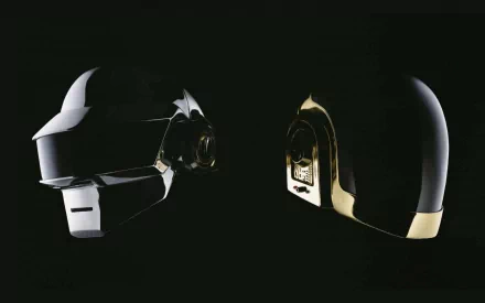 A striking HD wallpaper featuring the iconic helmets of Daft Punk, set against a dark background, capturing the essence of electronic music and visual artistry.