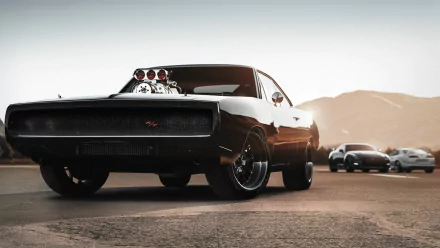 A high-definition PC desktop wallpaper featuring a detailed muscle car from the video game Forza Horizon 2, set against a scenic, sunlit backdrop.