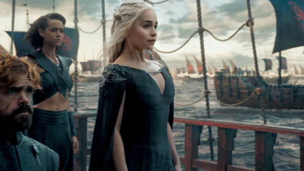 HD desktop wallpaper featuring Daenerys Targaryen, Missandei, and Tyrion Lannister from Game of Thrones, portrayed by Emilia Clarke, Nathalie Emmanuel, and Peter Dinklage, standing on a ship deck.