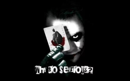 A striking HD wallpaper featuring Heath Ledger as the Joker from *The Dark Knight*, holding a playing card with the text Why so serious? against a dark backdrop.