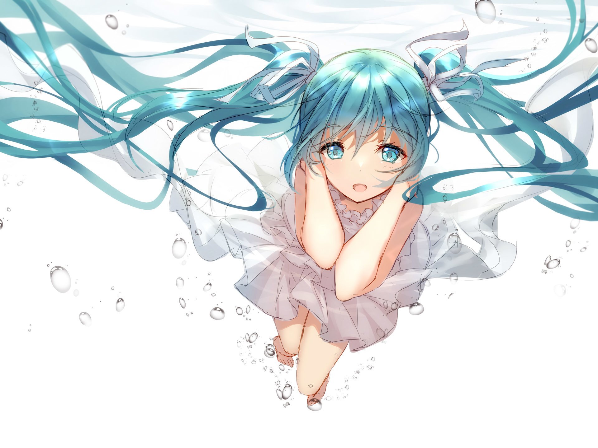 A stunning HD wallpaper featuring Hatsune Miku with aqua hair and eyes, twintails flowing underwater, creating a serene and enchanting underwater scene.