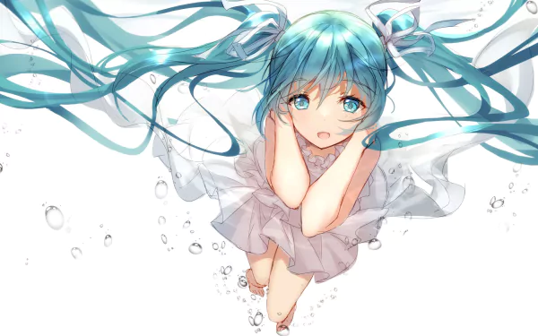 A stunning HD wallpaper featuring Hatsune Miku with aqua hair and eyes, twintails flowing underwater, creating a serene and enchanting underwater scene.