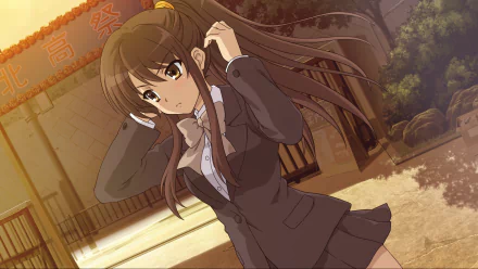 HD PC desktop wallpaper of Haruhi Suzumiya from The Melancholy of Haruhi Suzumiya anime, featuring her adjusting her hair outdoors in warm evening light.
