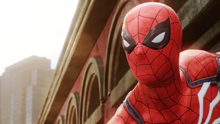 HD desktop wallpaper of Spider-Man from the PS4 video game, featuring Spider-Man in action against the backdrop of city buildings.