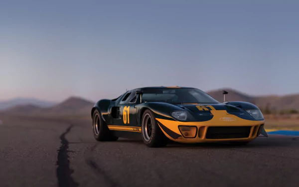 Tilt-shift black and orange Ford GT40 supercar on a racetrack, captured in high definition for a striking PC desktop wallpaper.