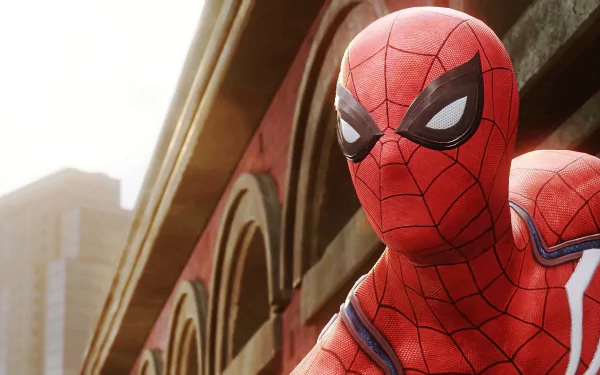 HD desktop wallpaper of Spider-Man from the PS4 video game, featuring Spider-Man in action against the backdrop of city buildings.