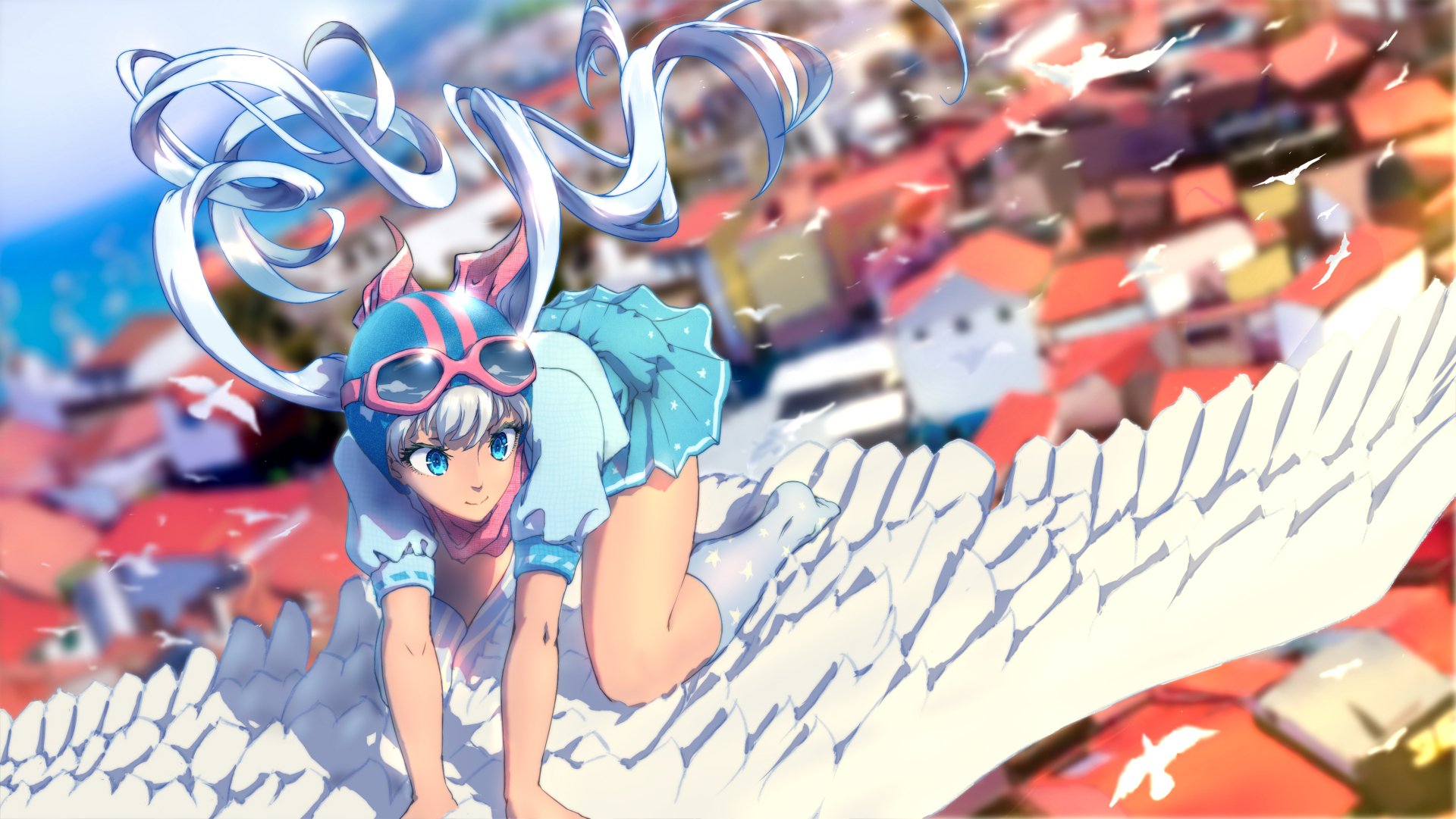 Anime-style original character with long blue hair, blue eyes, goggles, and a helmet crouches on white wings above a colorful town, rendered as an HD PC desktop wallpaper.