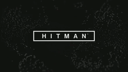 HD wallpaper featuring the logo of the video game Hitman (2016) against a dark, abstract background.