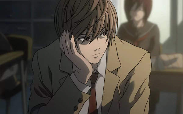 A HD desktop wallpaper featuring Light Yagami from the anime Death Note, wearing a school uniform and lost in thought, set against a classroom background.