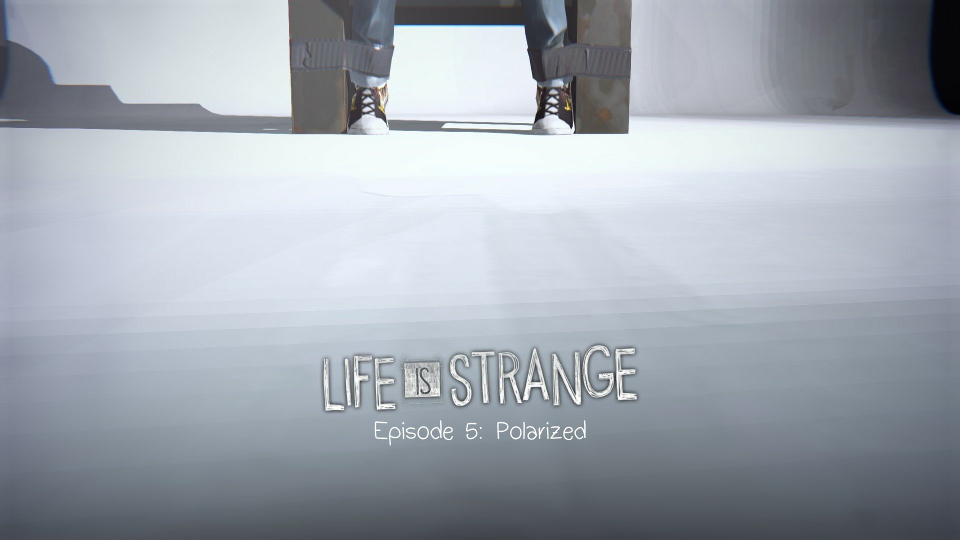 HD PC desktop wallpaper of the video game Life Is Strange (Episode 5: Polarized): minimalist white scene showing a seated character’s boots beneath a chair with the game title logo.