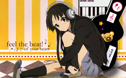 Mio Akiyama (K-ON!) anime character seated with headphones and stylized bass-guitar motif on a striped yellow background — 2K Quad HD PC desktop wallpaper/background.