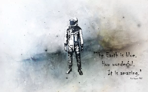HD desktop wallpaper featuring astronaut Yuri Gagarin with the quote, The Earth is blue. How wonderful. It is amazing. against a cosmic background.