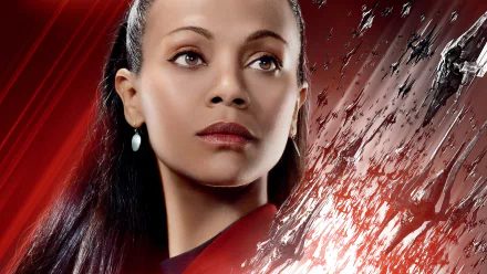 Zoe Saldana as Nyota Uhura in a striking 4K Ultra HD image from Star Trek Beyond, showcasing her fierce determination against a dynamic background.