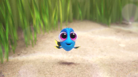 A vibrant HD wallpaper featuring Dory, the beloved character from *Finding Nemo* and *Finding Dory*, swimming cheerfully in a sandy underwater scene.