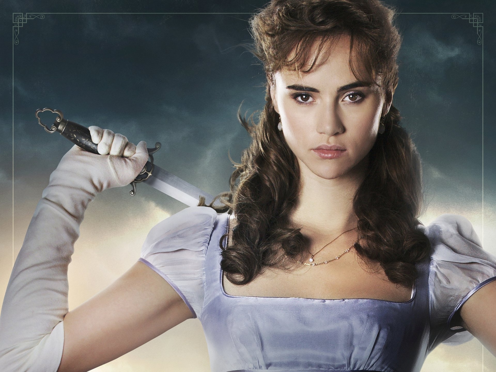 HD PC desktop wallpaper featuring a fierce female character from the movie Pride and Prejudice and Zombies, holding a knife against a dramatic sky backdrop.