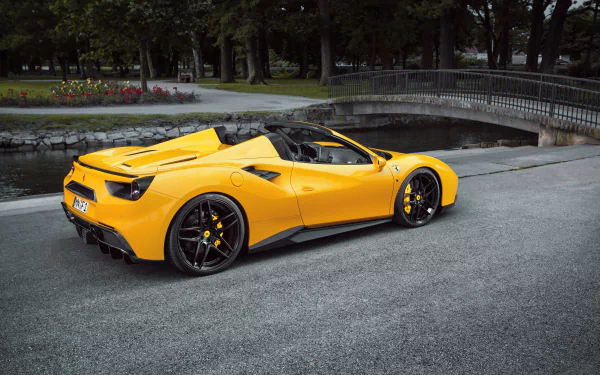 Yellow Ferrari 488 Spider supercar parked near a bridge, captured in 4K Ultra HD for a PC desktop wallpaper and background.