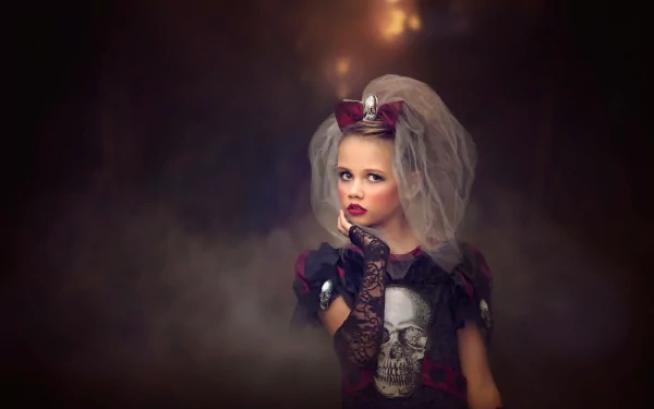 Gothic-themed Halloween portrait of a little girl in elaborate costume and veil, captured in 4K Ultra HD for a striking PC desktop background.
