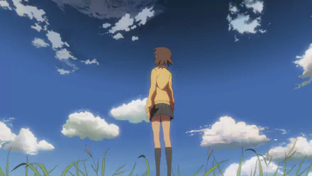 Anime wallpaper featuring Akari Shinohara from 5 Centimeters per Second standing in a grassy field under a vivid blue sky with scattered clouds, in HD quality.