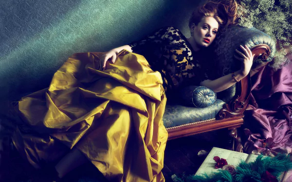 HD wallpaper of a British blonde singer wearing lipstick, reclining on an ornate chaise lounge, evoking a classic music-inspired portrait.