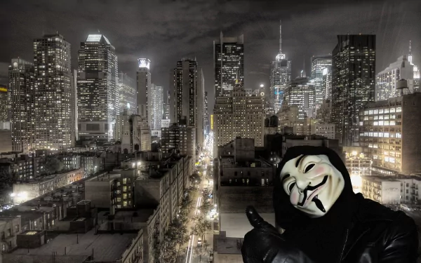 A high-definition desktop wallpaper featuring a character in a Guy Fawkes mask from the movie V for Vendetta, set against a backdrop of a lit city skyline at night.