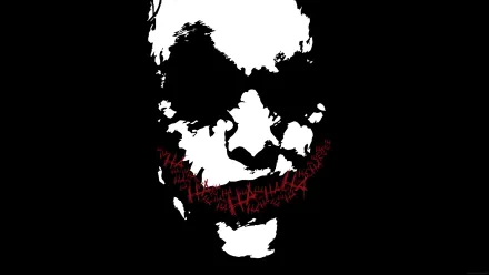 HD desktop wallpaper of the Joker from the movie The Dark Knight, featuring a minimalist black-and-white design with red text across the iconic smile.