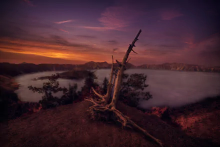 HDR 4K Ultra HD image of Crater Lake at evening, featuring a dramatic sky and serene nature surrounding the calm lake waters.