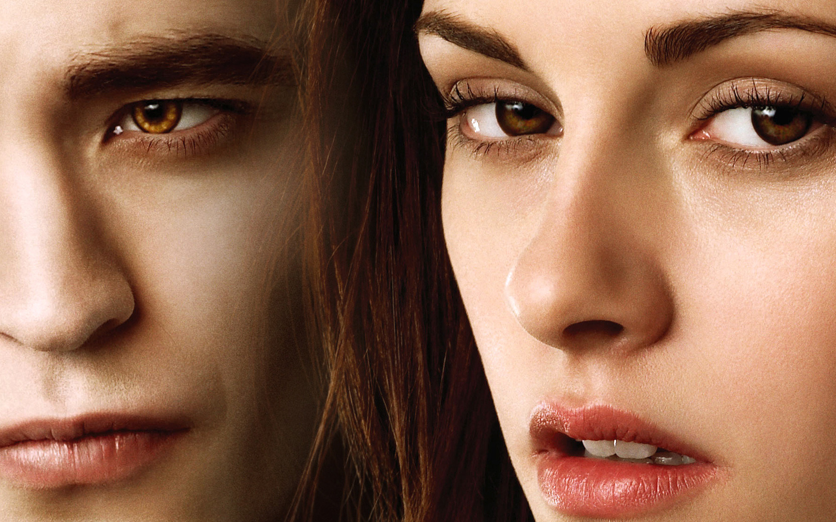 Robert Pattinson and Kristen Stewart in a romantic scene as Edward Cullen and Bella Swan
