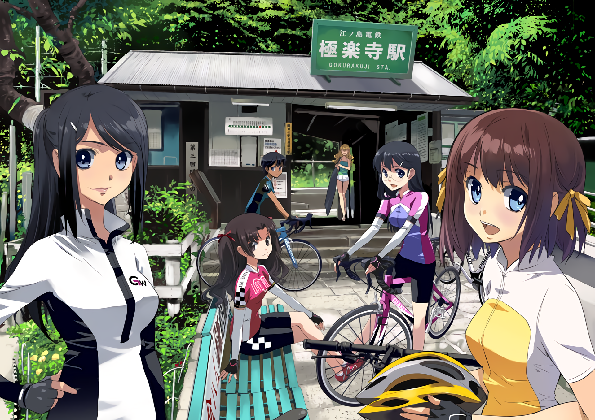 HD PC desktop wallpaper featuring anime characters from Minami Kamakura Koukou Joshi Jitensha-bu gathered with bicycles near a train station surrounded by lush greenery.